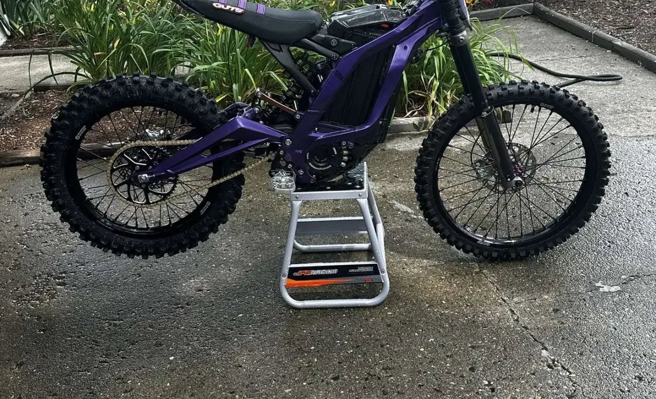 Purple Sur-Ron Light Bee X fitted with an 18/21 wheel set